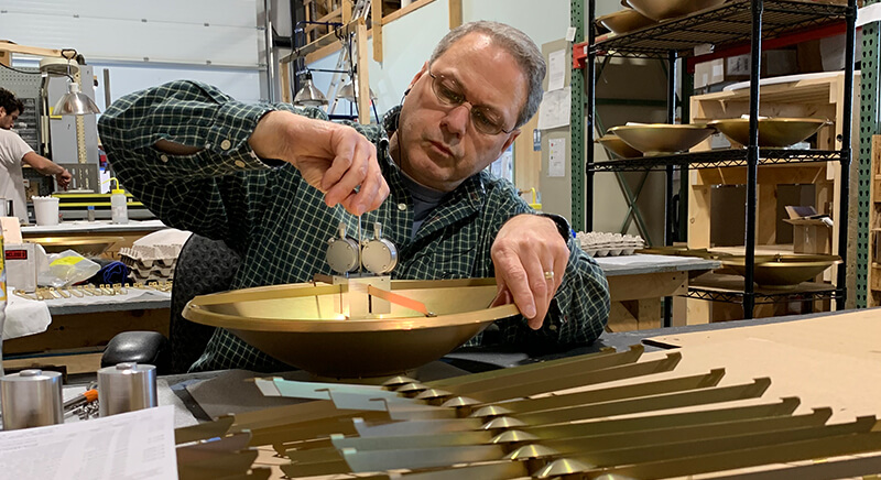 Alaris mWave team member assembling antenna
